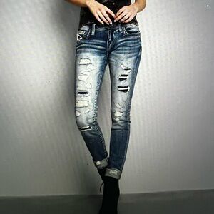 Buckle Black. Fit No. 53 Skinny Stretch Jean. Waist 28. Inseam 29
